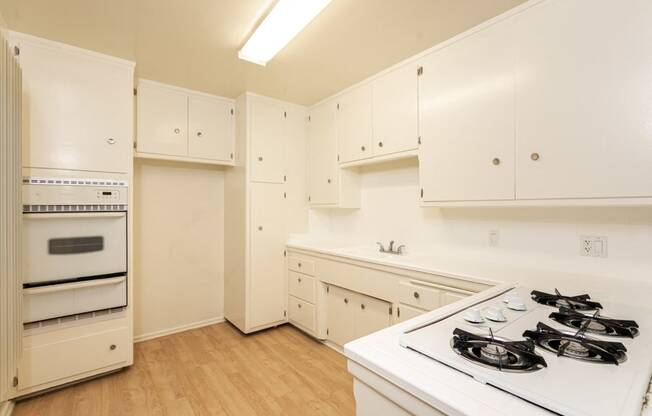 Kitchen with White Appliances and White Cabinets