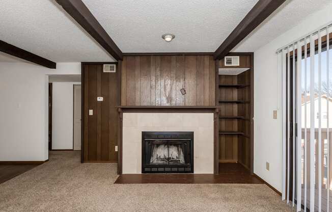 West One Bedroom Living Room and Fireplace at Raintree Apartments, Topeka, KS, 66614