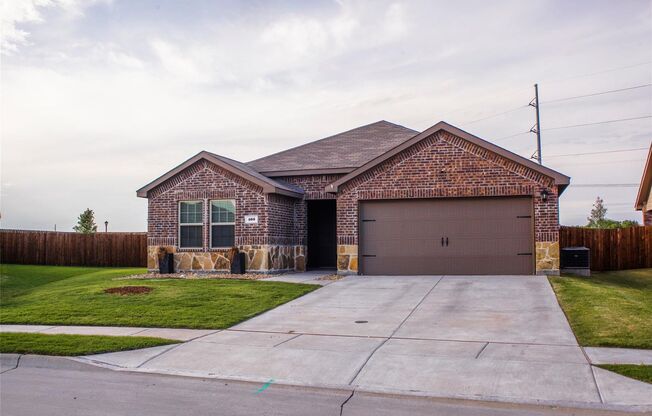 Boasts 4 bedrooms with 2 baths on a premier lot. As you enter the home, you will be greeted with an open entry way that leads to the open concept living room