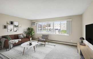 a living room with a couch and a table and a large window