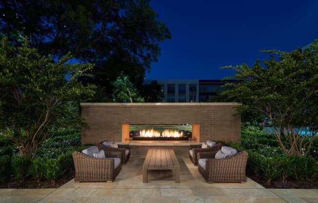 Outdoor Lounge Area With Fireplace at Everra Midtown Park, Dallas, 75231