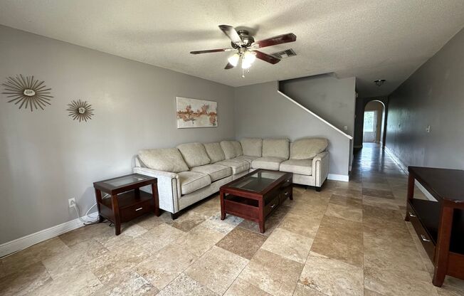 Beautiful Townhome in a gated community with assigned parking spots and a community pool