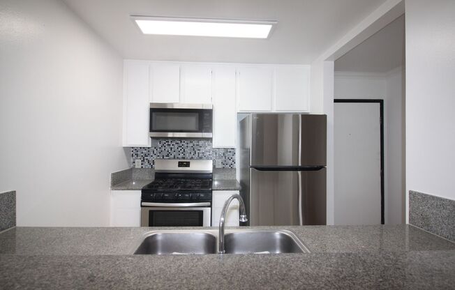 14033 FOOTHILL BLVD.