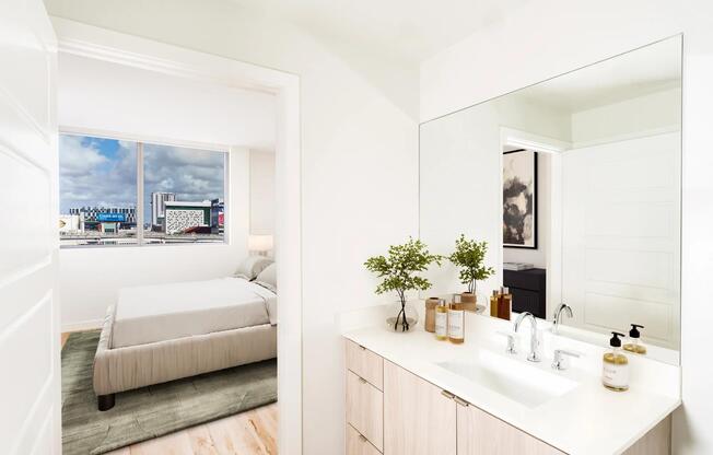 Designer bathrooms with quartz countertops and custom cabinetry.
