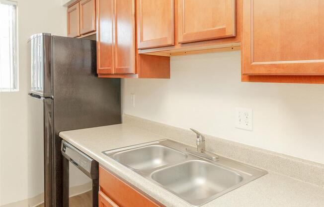 Stainless Steel Sink With Faucet In Kitchen at Cimarron Place Apartments, Tucson, AZ