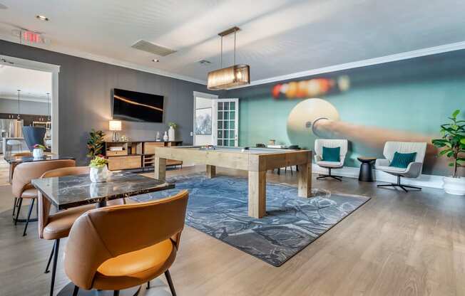 a living room with a dining room table and chairs at Reserve by the Lake, Texas