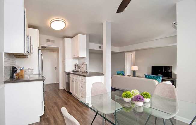 Glass table, TV in Living Room at Los Robles Apartments, California, 91101