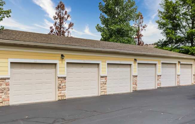 a row of three garage doors in a row