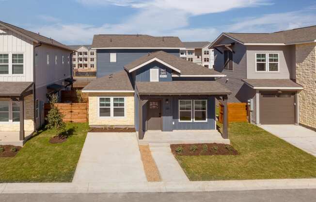 a house with a sidewalk in front of it