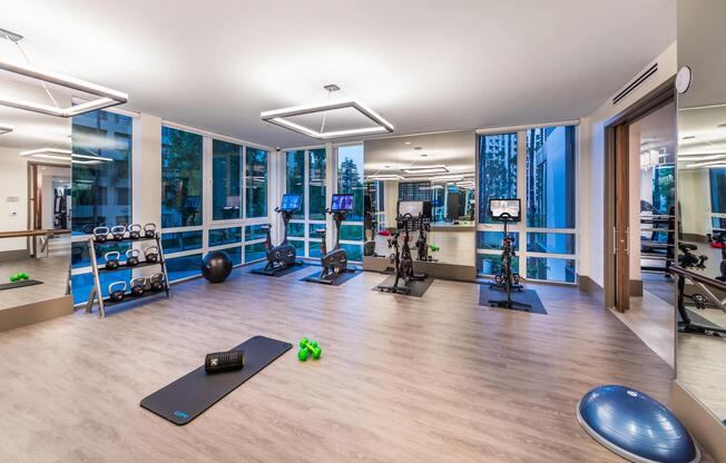 Cycling, yoga, and Pilates studio designed for mindful movement.