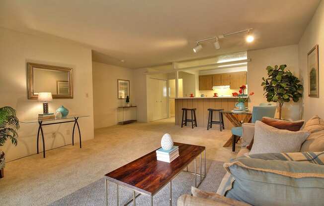 a living room with a couch and a table