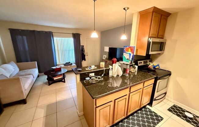CENTRALLY LOCATED RENOVATED 1 BED 1 BATH CONDO WITH PARKING