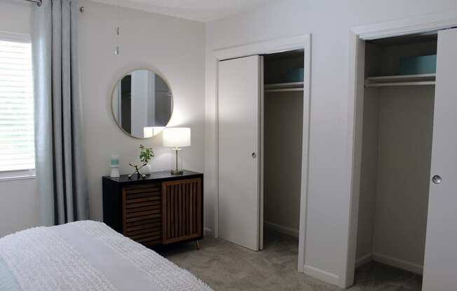 two double closets in bedroom with plush carpeting  at Huntsville Landing Apartments, Huntsville, Alabama