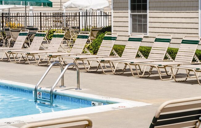 built in pool and sundeck lounge chairs at Medford Pond, Medford, New York