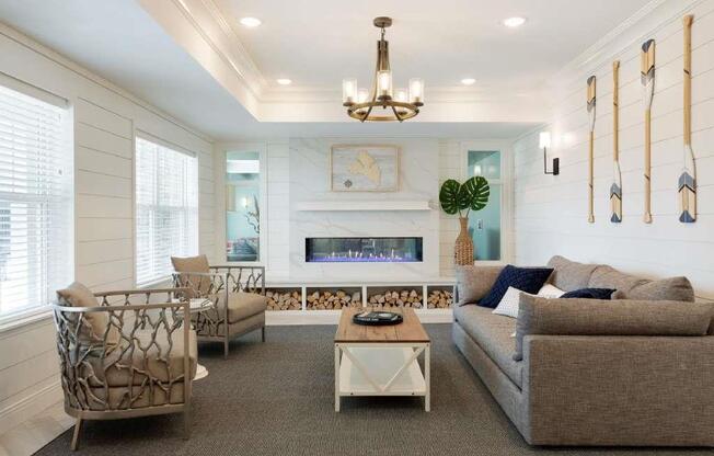 Bright and airy lobby living room with couch and chairs