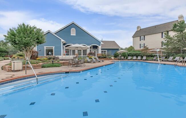 a house with a large pool of water