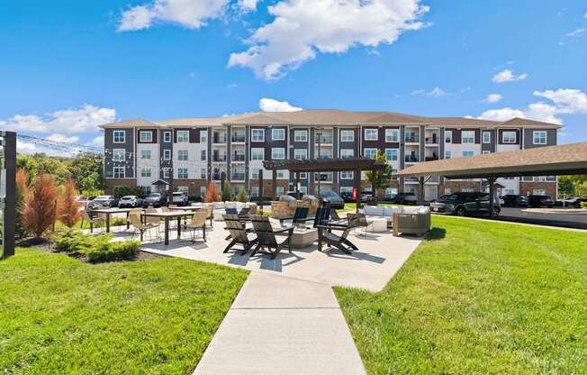 A large building with a grassy area in front of it.