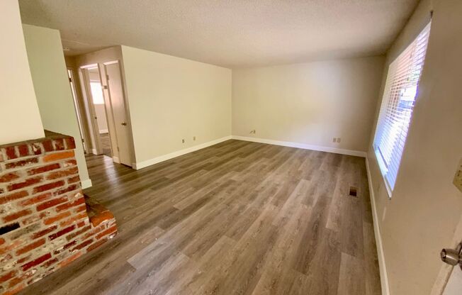 Nicely Renovated 2 Bedroom, 1 Bath Duplex with Washer/Dryer Hookups + Off Street Parking