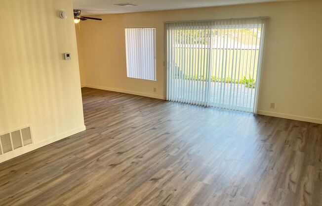 Large two-story townhouse with 3 bedrooms and 2 full baths and a private patio
