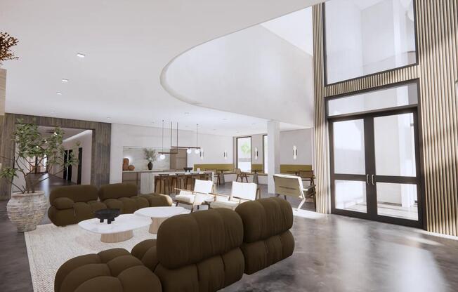 Inviting lobby with lounge seating and an abundance of natural light at Modera Revere Beach.