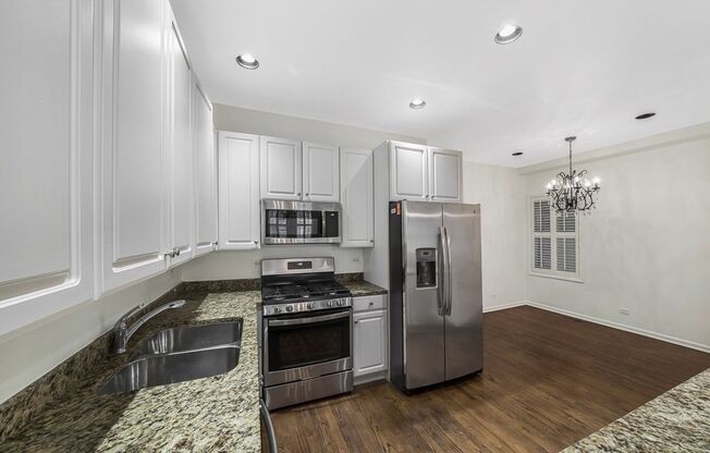 Available 6/1/26! Stunning Duplex Steps from Wrigley Field