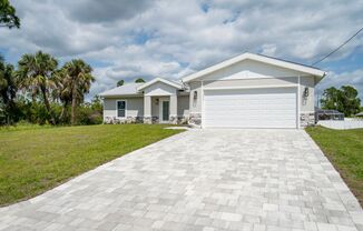 WATER & SOLAR INCLUDED - BRAND NEW 3 bed / 2 bath / Office / 2 car garage! NORTH PORT FLORIDA