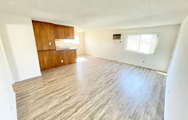 Sunny Top-Floor 2BR/2BA Home with Garage & A/C