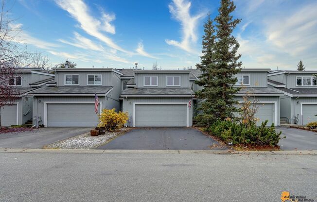 East Anchorage Condo with Fenced in Yard, W/D in unit, & 2 Car Garage! Close to JBER, Baxter Bog Park, and Baxter Elementary School.