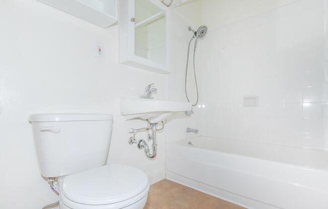 Bathroom with white appliances