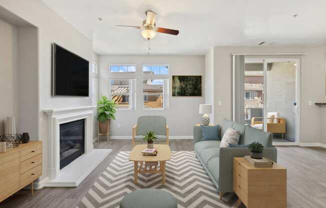 a living room with a couch and a fireplace