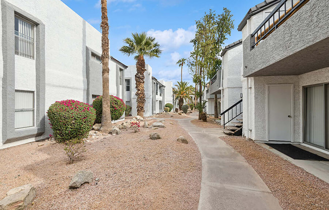 Exterior Community Building and Landscape at Crystal Creek Apartments in Phoenix, AZ.