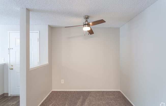 Separate dining or office area with ceiling fan