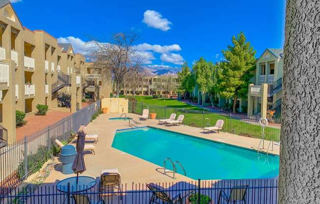 the swimming pool at the enclave apartments
