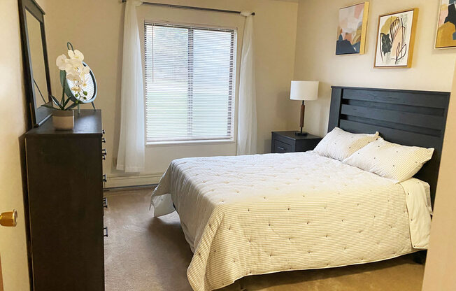 Spacious Master Bedroom at Wood Creek Apartments in Kenosha, WI