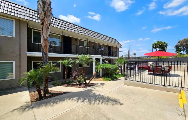an empty road with a building in the background
