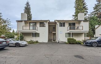 Affordable and Updated 2 Bed 1 Bath Kirkland Condo w/ Assigned Parking & Deck/Balcony!