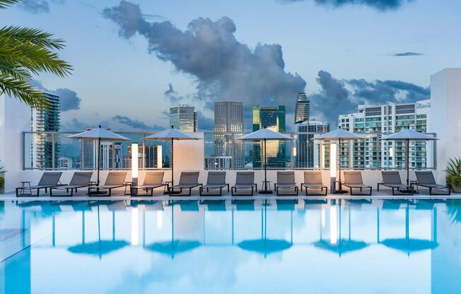 Take in breathtaking Miami skyline views from Modera Riverside’s rooftop pool deck.