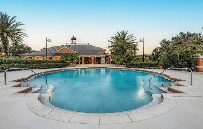 a large swimming pool with pool house in the background, Henley Tampa Palms, Tampa, FL