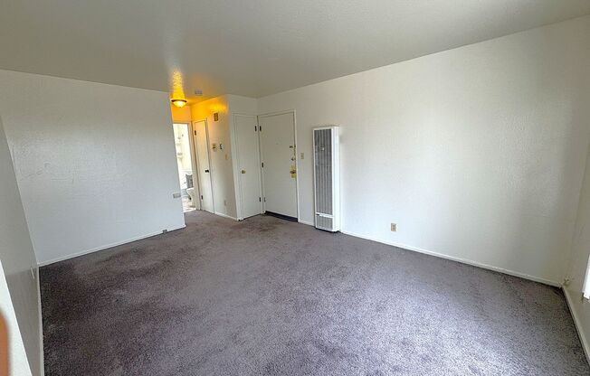 Updated Spacious unit, freshly painted throughout, with updated flooring in the kitchen