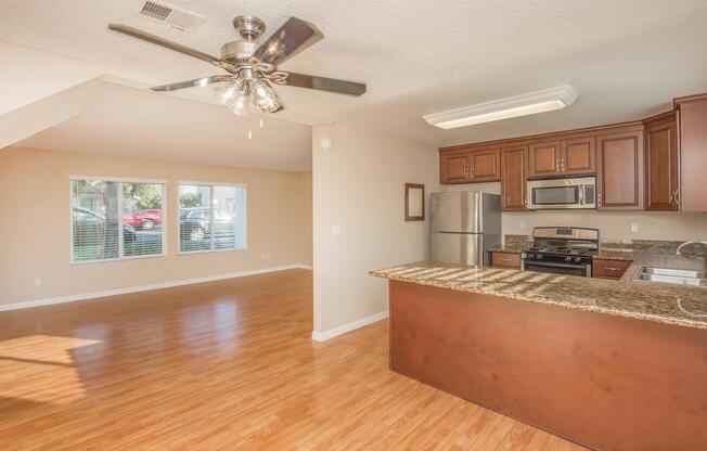 a kitchen with a wood floor