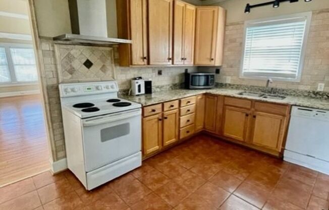 Introducing WesleyHeights401, a charming 3-bedroom, 2-bathroom house located in the heart of Charlotte, NC