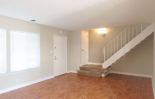Spacious 2-Story Townhome, A/C, Remodeled Bathrooms, Fresh Paint, Patio, 2C Parking, Great Location!