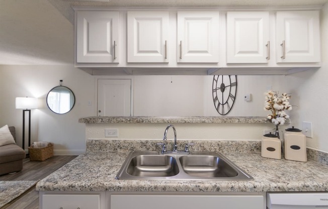 This is a photo of the kitchen of the 515 square foot 1 bedroom apartment at Canyon Creek Apartments in Dallas, TX