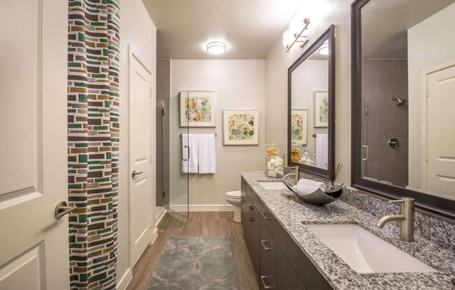 a room with a sink and a mirror