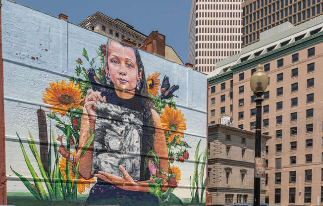 A mural of a person with flowers in Providence