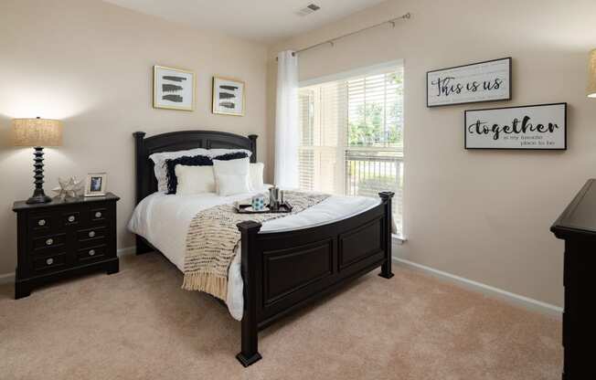 Beautiful Bright Bedroom With Wide Windows at Abberly Place at White Oak Crossing Apartments, HHHunt Corporation, North Carolina