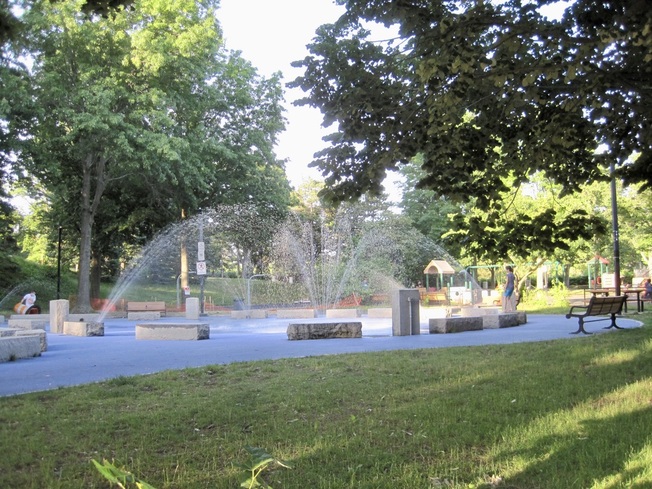 A local playground with a splash pad