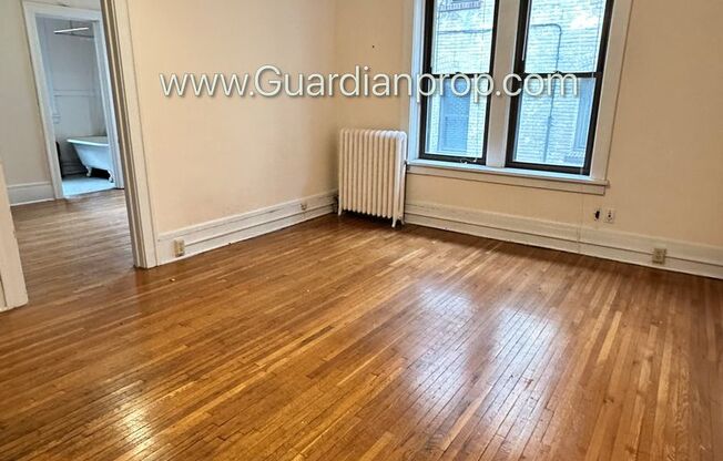 Spacious 1 Bedroom Lakes Uptown Apartment, Blocks from Both Lakes, Hardwood Floors, One Month Free