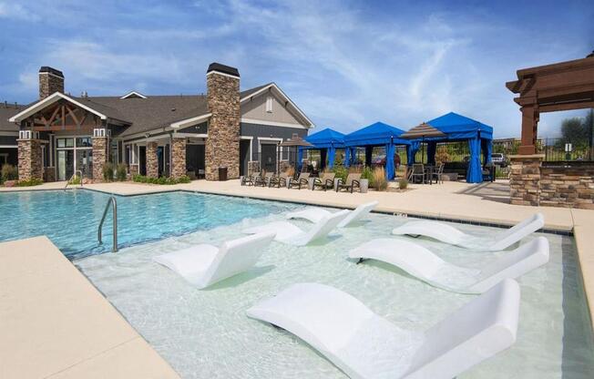 Poolside Sundeck With Relaxing Chairs at Watermark at Harvest Junction, Longmont, 80501