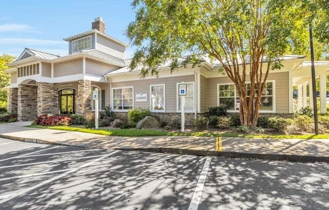 a large house with a tree in front of it at Marina Point, Chattanooga